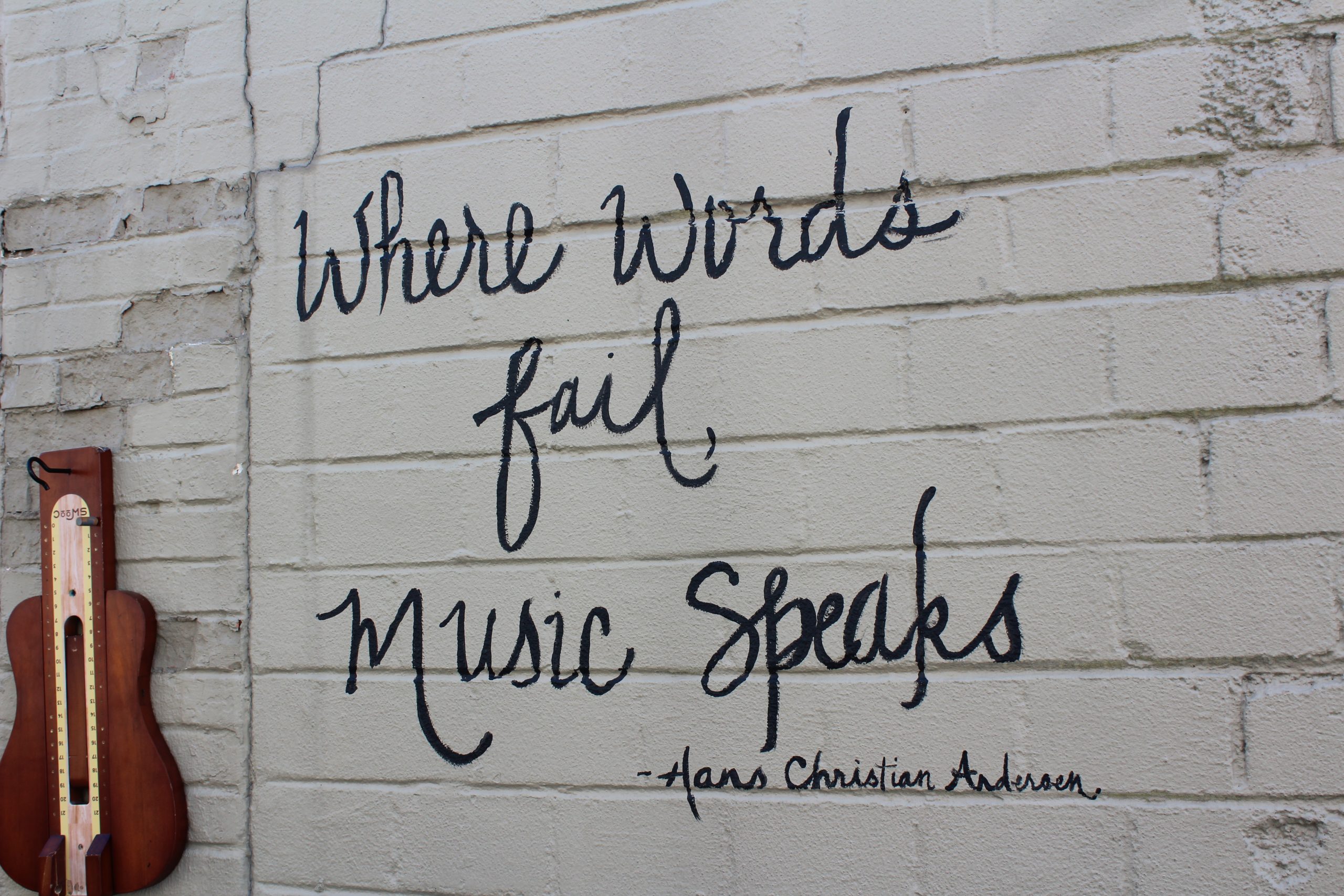 street art that says where words fail music speaks